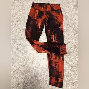 Reebok Orange and Black Patterned Leggings